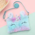 Macro detail of plush unicorn shoulder bag featuring soft gradient fur and sequin horn - Light Blue Squinting