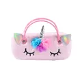 Detail of pink plush unicorn bag with 3D floral accents and holographic ears - Pink