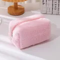 Close-up of soft pink plush cosmetic bag with high-quality silver metal zipper - Water Pink