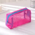 Close-up of pink mesh pencil case with blue zipper showing breathable nylon texture - Rose Red