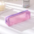 Detail of a pink mesh pencil case with a smooth zipper and breathable texture - Small / Pink