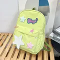 Detailansicht hellgrüner Nylon-Rucksack mit Stern-Patches und Omg-Stickerei für Schule - Hellgrün