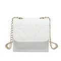 Chic white quilted crossbody chain bag with elegant gold-tone hardware and geometric patterns - White