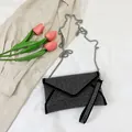 Fashionable black envelope handbag with silver rhinestones and metal chain strap - White