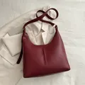 Burgundy minimalist hobo shoulder bag with matte synthetic leather and gold hardware - Red