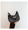 Fashionable black crescent shoulder bag with silver rhinestones and bow accent - Black