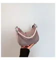 Pink underarm bag with silver studs and a metallic bow detail for trendy women - Pink
