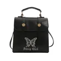 Zaino vintage in pelle nera con ricamo a farfalla e scritte gotiche in argento lucido - Nero