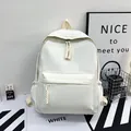 Minimalist solid white large capacity backpack for students with woven zipper pullers - Off White