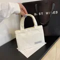 Chic cream white corduroy tote bag featuring minimalist texture and vintage design - White