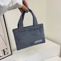 Mini corduroy tote bag in grey-blue with ribbed texture and dual handles - Gray