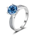 Elegant S925 sterling silver ring featuring a round blue moissanite in a six-prong setting - Size 5 / Sea Blue (3 Carat)