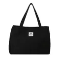 Borsa tote minimalista in tela nera con etichetta grafica bianca per shopping quotidiano e studenti - Nero