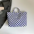 Blue and white checkerboard PVC tote bag with stylish top handles and a glossy finish - Tote Bag / Blue Checkerboard