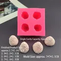 Detail view of pink silicone strawberry mold with dimensions 7x7x3.5cm and 8g capacity - Four Large Strawberries / Pink