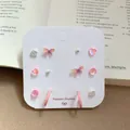 Pink heart and butterfly earring set with 12 pieces on a white display card - OT1 Pink Set / 6 Pairs Set