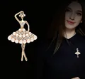 Golden ballet dancer brooch featuring white pearls and rhinestones on a black background - Ballet Dancer (Gold Pearl Dress)