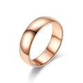 Detailed macro view of rose gold stainless steel band ring with polished finish - 6mm Rose Gold / Size 6