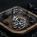 Retro gothic skull hand ring in vintage silver finish with a punk skeleton design - J266 Claw