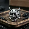 Detailed view of a vintage silver Hannya mask ring with intricate gothic metal carving - J257 Ghost Head