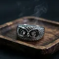 Detailed macro view of vintage owl ring with intricate silver-toned feathers and eyes - J279 Owl