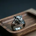 Macro shot of retro leopard head ring with vintage vulcanized silver finish and metal details - J281 Bear Head