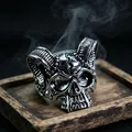 Macro shot of gothic skull and horn ring with vintage oxidized finish and smoke detail - J292 Sheep's Head