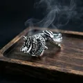 Macro detail of retro silver dragon ring with intricate scale relief and dragon head design - J296 Dragon