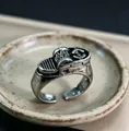 Close-up of vintage industrial ring with mechanical motifs and antique silver finish - J309 Machinery
