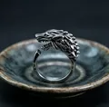 Detailed view of a silver wolf head ring with intricate 3D carvings and viking style - J317 Wolf Head