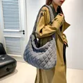 Gray quilted corduroy tote bag featuring a large capacity and wide shoulder strap - Gray