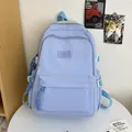 Minimalistische lichtblauwe nylon rugzak voor studenten met reliëfmerklogo op de voorkant - Blauw