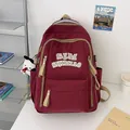 Wasserabweisender burgunderroter Nylon Rucksack für Schüler mit Schneemann Anhänger - Rot