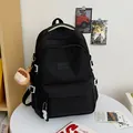 Black minimalist school backpack with multi-layer zippers and cute doll pendant - Black With Brown Bear Charm