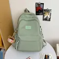 Light green school backpack with cute plush charm and multiple zipper pockets - Green With Brown Bear Charm