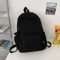 Sac à dos en toile noire au style minimaliste avec poches multiples et cordons blancs - Sans Pendentif / Noir
