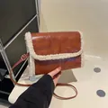 Brown faux leather crossbody bag with cream fleece trim and thin shoulder strap - Brown