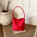Chic red nylon shoulder bag featuring 'Hope and future' embroidery in a minimalist style - Red