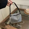 Elegant silver rhinestone evening bag with black strap and chain in a cafe setting - Black