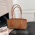 Fashionable leopard print tote bag with leather handles and gold GIHAIDI logo detail - Tan