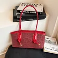 Red leopard print shoulder bag in suede and glossy leather with metallic details - Red