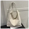 Minimalist creamy white large tote bag with wide shoulder strap in premium matte finish - Off White