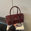 Retro burgundy crossbody bag with contrast stitching and top handles in faux suede - Burgundy