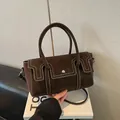 Vintage dark brown suede handbag with white stitching and detachable shoulder strap - Brown