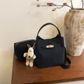 Zwarte matte suède emmertas met gouden sluiting en schattige honden hanger - Zwart Met Hanger