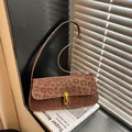 Franse baguette-tas met bruine luipaardprint en goudkleurige metalen gesp - Bruin