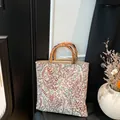 Shopper-Tasche mit floralem Webmuster und natürlichen Bambusgriffen im Retro-Stil - Lila Blume