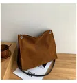 Brown corduroy shoulder tote bag with sleek black straps and elegant metallic eyelets - Brown
