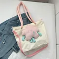 Cute canvas tote bag with pink plush star character and adjustable shoulder strap - White