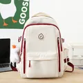 Japanese style large capacity cream backpack with red accents and goose plush charm - With Large White Duck Pendant / Cream White & Red